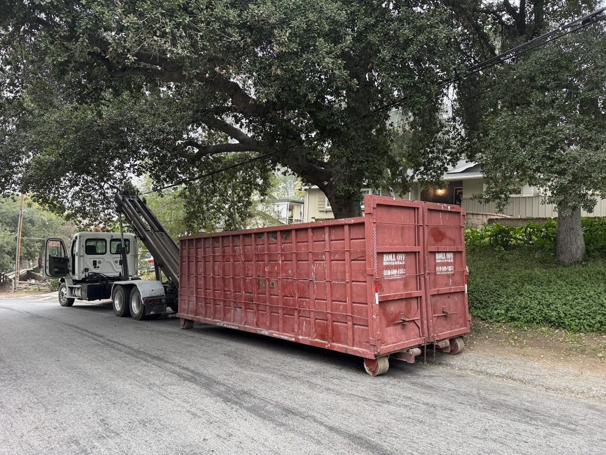 Roll-off dumpster delivered to a residential driveway in the San Fernando Valley